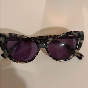Fossil Tortoiseshell Cat Eye Sunglasses with Purple Lenses